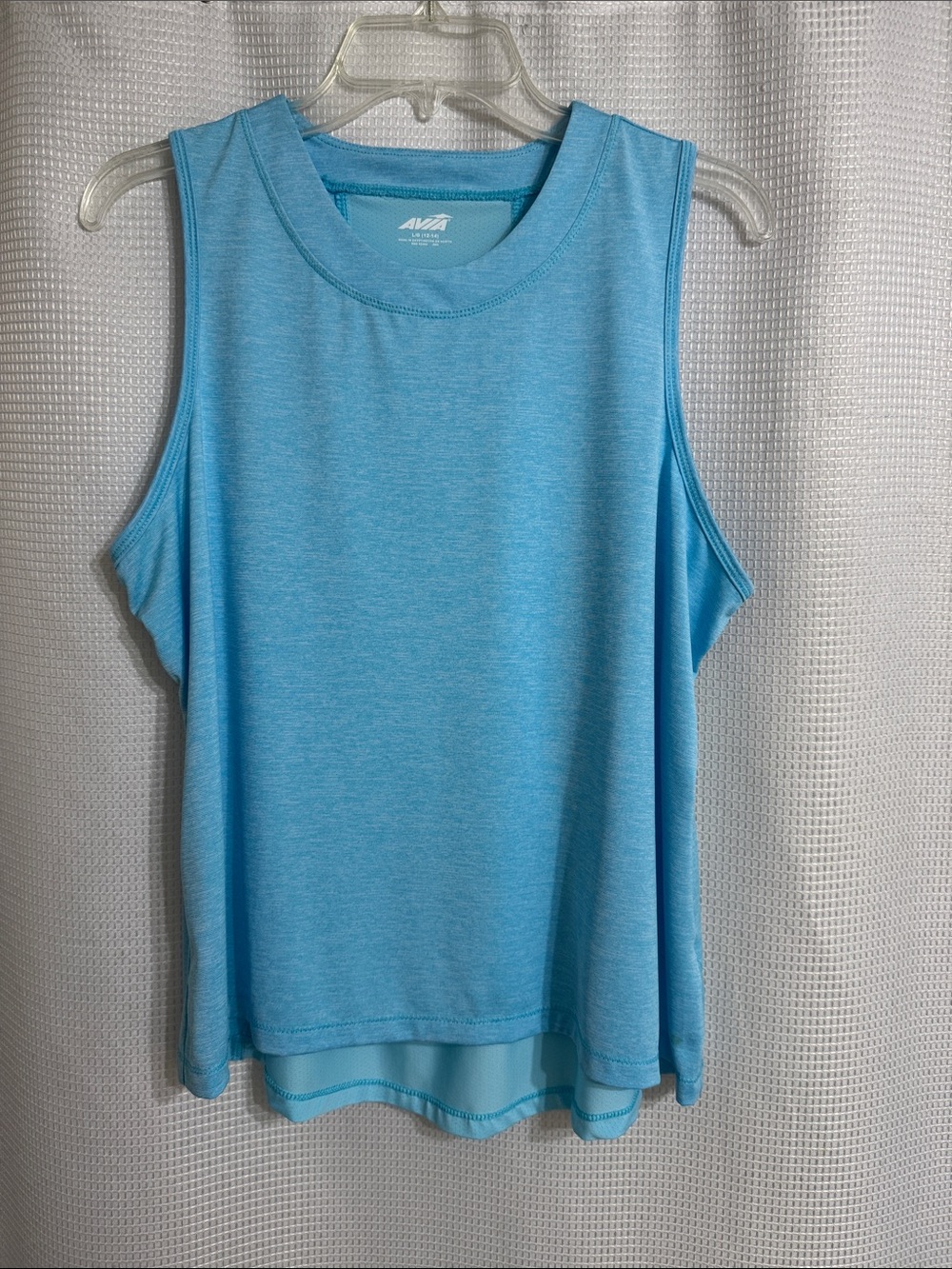 NWOT Avia pull over, hi low, sleeveless top. Size LG (12-14)